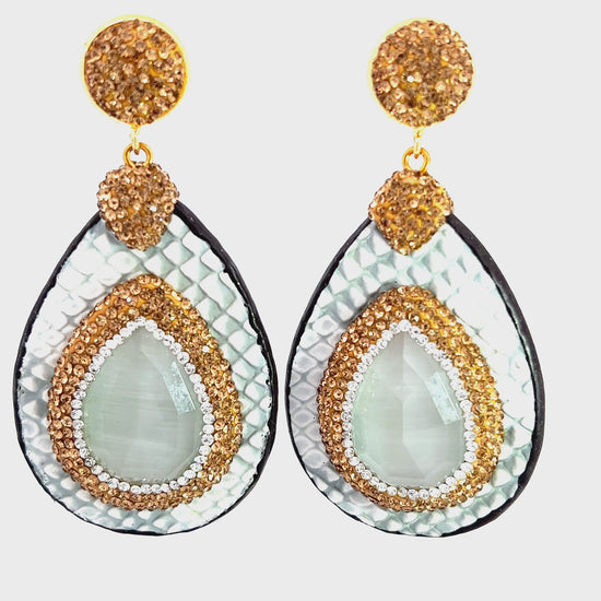 Load and play video in Gallery viewer, Silver Leopard Leather Teardrop and Crystal Earring
