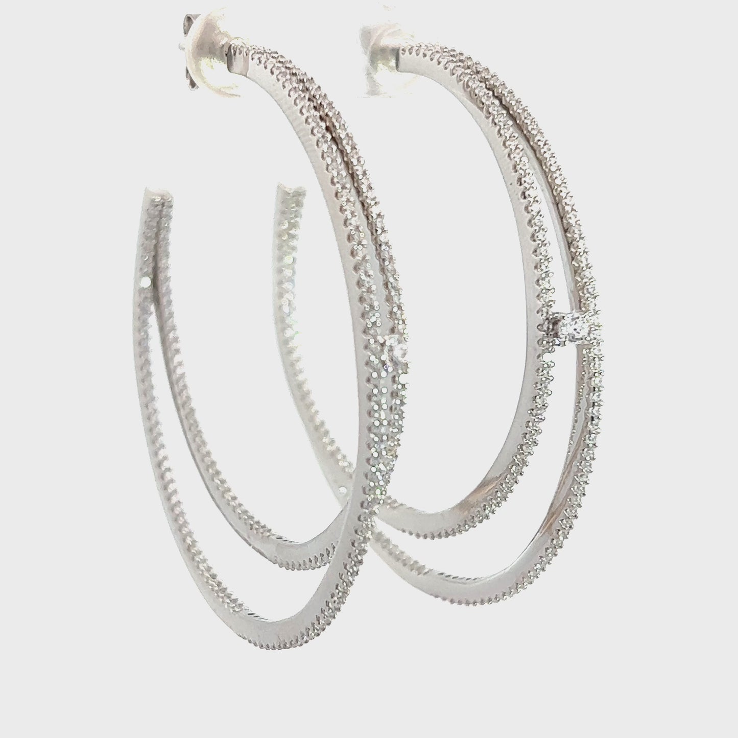 Load and play video in Gallery viewer, Crystal CZ Sterling Silver Double Hoop Earring
