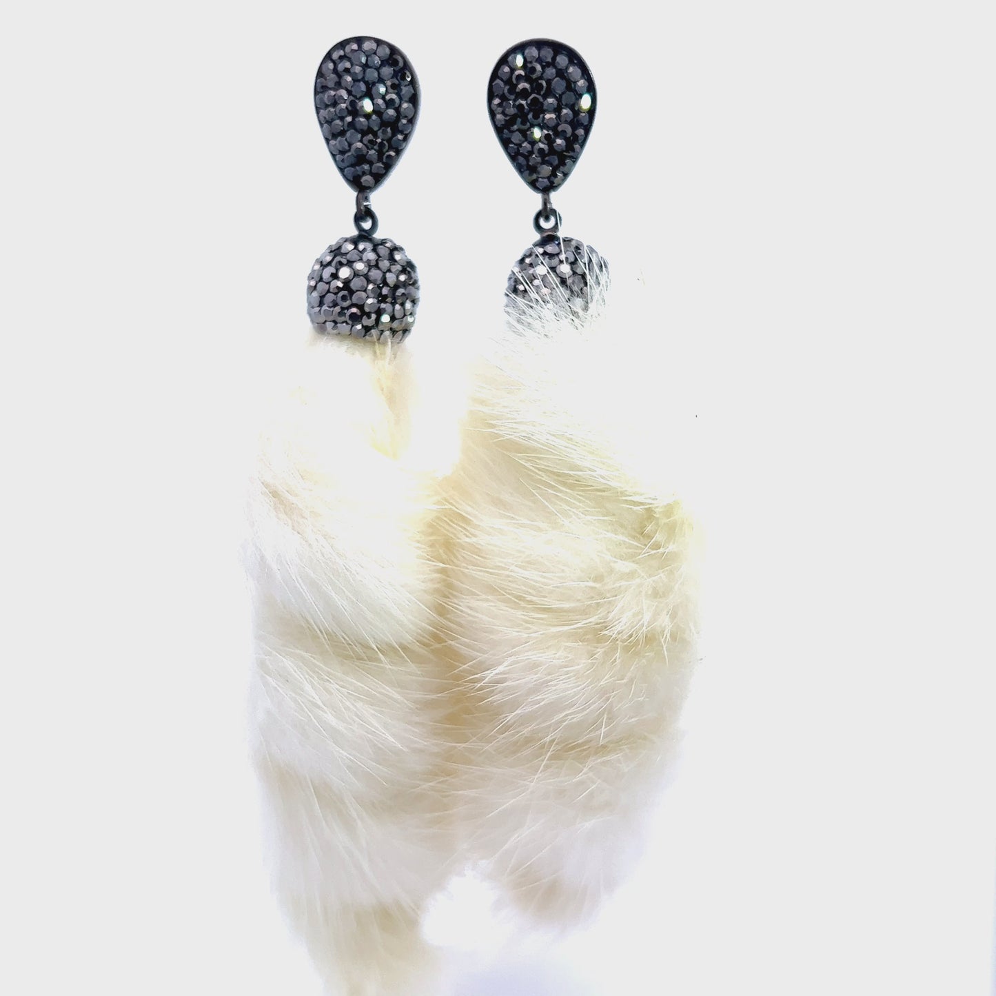 Load and play video in Gallery viewer, White Fur Swirl Crystal Earring
