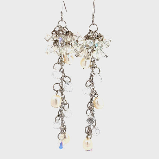 Load and play video in Gallery viewer, Iridescent Crystal Dangling Silver Earrings
